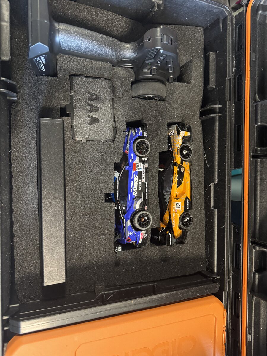 Pit box overhead: both cars and the KT-531P in foam